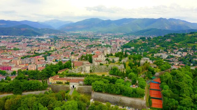 Brescia, Italy. Castello di Brescia. Flight over the city in cloudy weather. Drone footage, Point of interest