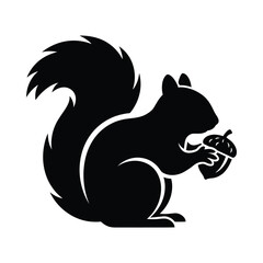 A black silhouette of a squirrel holding an acorn in its paws © Esrat