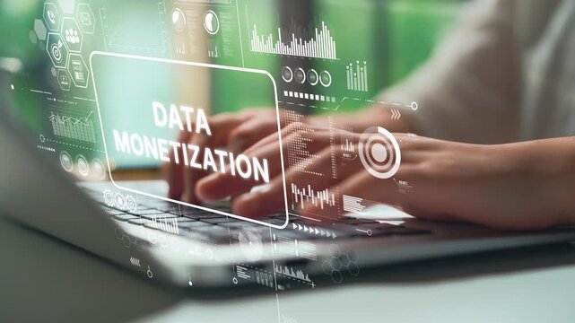 Hands Typing on Laptop with Data Monetization Concept and Digital Graphs in Modern Workspace Environment. Asymptotic smart data analytic.