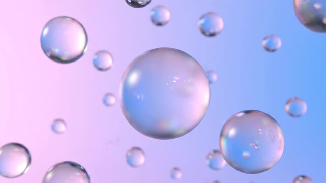 Abstract 3D Render of Clear Spheres Floating in a Gradient Pink and Blue Background.