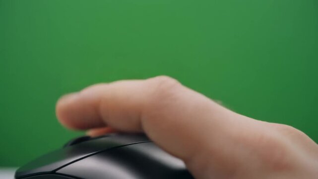 Detailed Greenscreen mouse on green screen background chroma key ready with click scroll wheel and pointer control for software tutorial content and digital creation professional technology footage