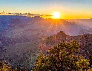 Majestic canyons bathed in golden sunlight at dawn