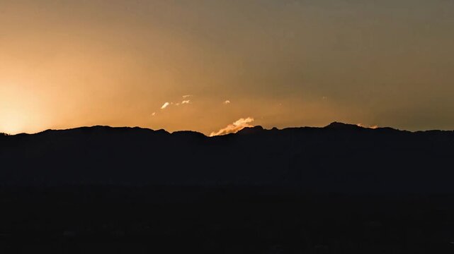 Sunrise timelapse over the mountains