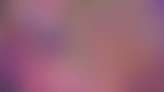 Soft Abstract Color Gradient with Warm Purple Hues and Subtle Blurred Textures.