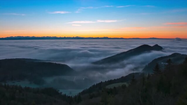 sunrise timelapse over the mountains and clouds