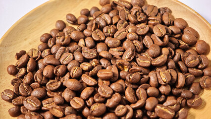 Close up of roasted brown coffee beans 