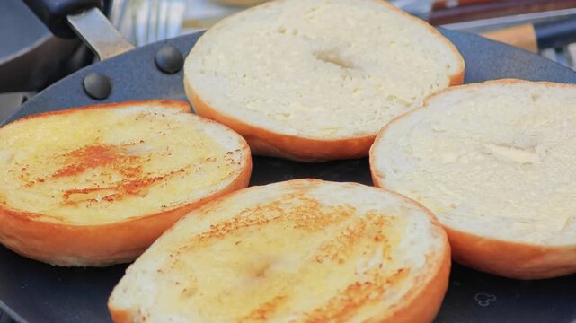 Grilled bagle and butter for breakfast.