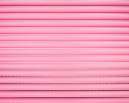 Sweet soft pink horizontal cylinder curve pattern on a metal shutter door. Abstract pastel background with parallel lines and industrial texture for creative design.