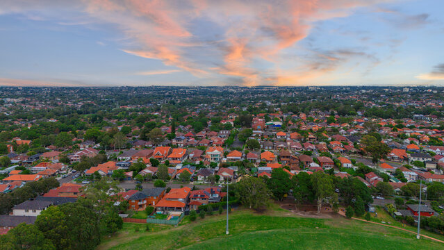 Panoramic Aerial Drone view of Inner Western Suburbs of Sydney housing, roof tops, the streets and the parks, the roads and trees of Ashbury Ashfield Burwood Summer Hill Canterbury and Campsie in Sydn