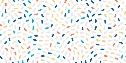 Colorful confetti pattern with scattered shapes on a white background