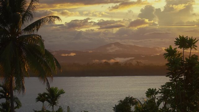 Prince Alexander Mountains Wewak Hill vibrant sunset Cape Wom Public Beach Wewak Papua New Guinea PNG Papua Niugini Boutique Hotel landscape panoramic view East Sepik Province clouds breeze palm trees