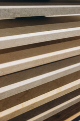 Stacked marble and stone samples displaying natural textures for interior design and architectural material selection