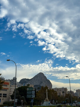 Avenida Juan Carlos I, 15, 03710 Calpe, Alicante, Spain.
traffic in the city center, signs. banners with the name of the city. City in Spain .view of the city