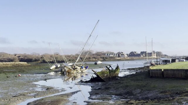 Abandoned Sailboats at Low Tide in Gosport Harbor England
