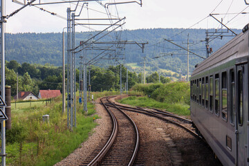 Fototapeta premium intercity train passing railway crossing
