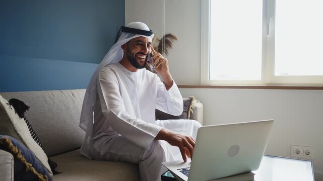 Men with dish dasha working in business office of Dubai. Portraits of  successful businessmen in traditional emirates white dress. Concept about middle eastern cultures.	
