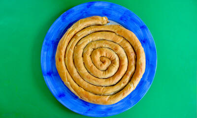 Spanakopita on a serving dish