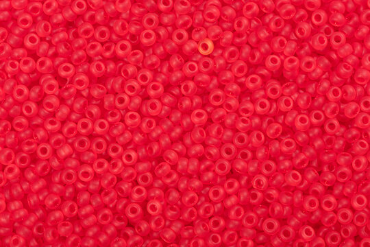 Light red seed beads.