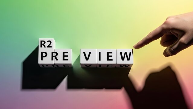 Hand Pointing at Preview and R2 Stacked Letter Blocks on Colorful Gradient Background