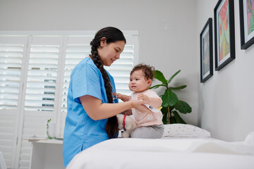 Obraz premium Nurse Showing Temperature Reading to Camera