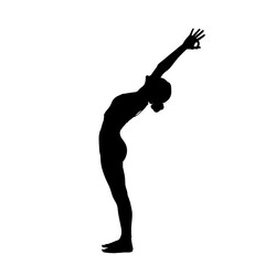 Fototapeta premium Silhouette of woman performing a backward bend yoga pose.
