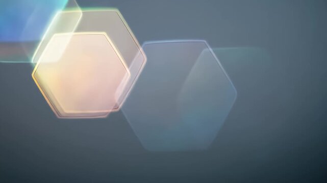 Abstract, blurred geometric shapes with colorful outlines against a muted gray background