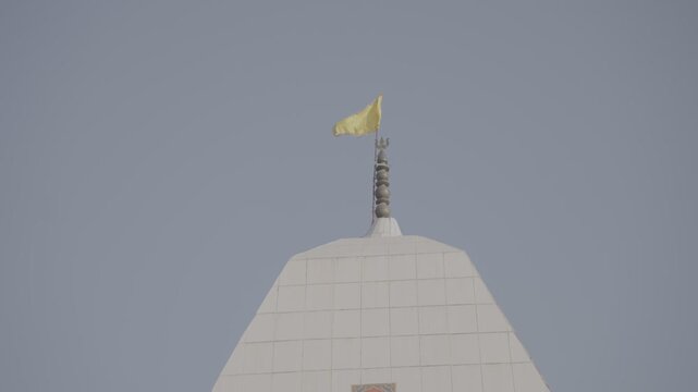 Flag at the dome of the temple of Naag Devta Mandir, Uttarakhand, India