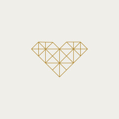 Abstract golden outline heart logo. Luxury symbol suitable for fashion, jewelry, healthcare, spas and wellness related businesses.
