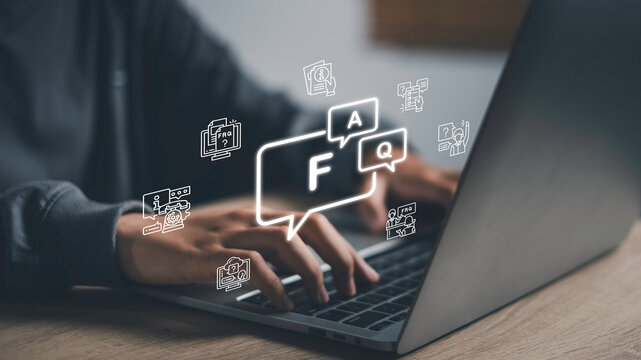 FAQ icons and online help elements displayed over a laptop screen, Digital customer support, knowledge base management, and interactive question and answer service platforms.