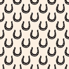 Seamless horseshoe pattern symbolizing luck and western culture