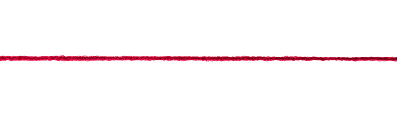 Thread isolated on white background. Selective focus. © yanadjan