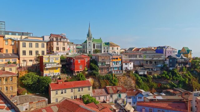 Flying over Cerro Concepcion and the Lutheran Church on a sunny morning in the city of Valparaiso, Chile