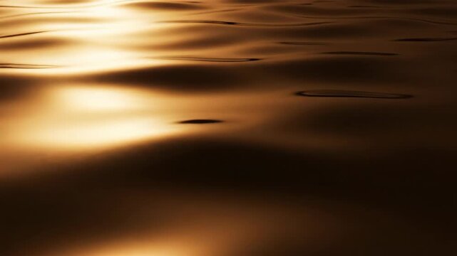Liquid surface rippling with strong metallic bronze light reflection