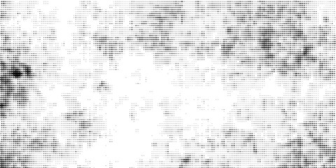Halftone abstract background. The monochrome texture of dots of ink. Grunge pattern for printing and creating design