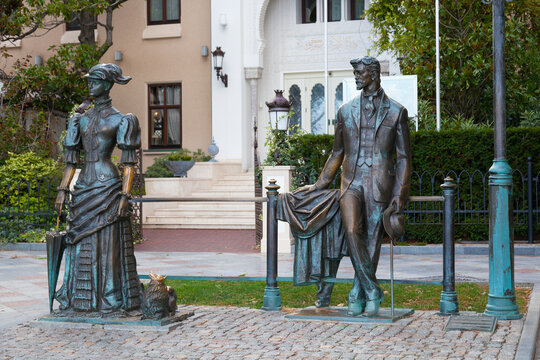 RUSSIA, YALTA - SEPTEMBER 24, 2015: Sculpture Anton Chekhov and the Lady with Dog in Yalta, Crimea
