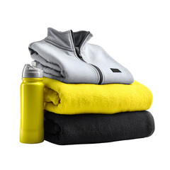 Stack of athletic clothing and water bottle for sports and fitness
