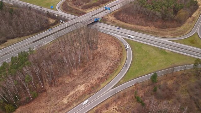 Aerial Drone View of Highway Interchange with Curved Ramps in Autumn