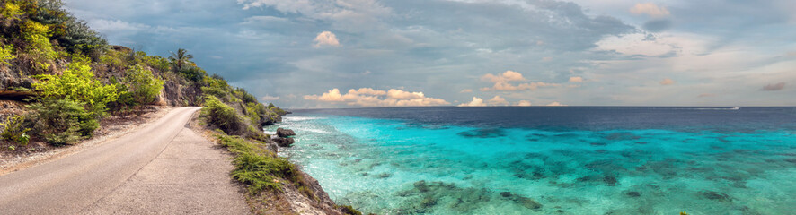 Road trip along the wild coast of the island of Banaire near 1000 steps beach, South Caribeean sea