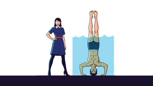 Confident woman in a blue dress stands next to a man performing an underwater handstand in a small tank or pool of water.