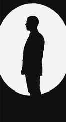 Man Silhouette Standing in Front of Large White Circle on Black Background