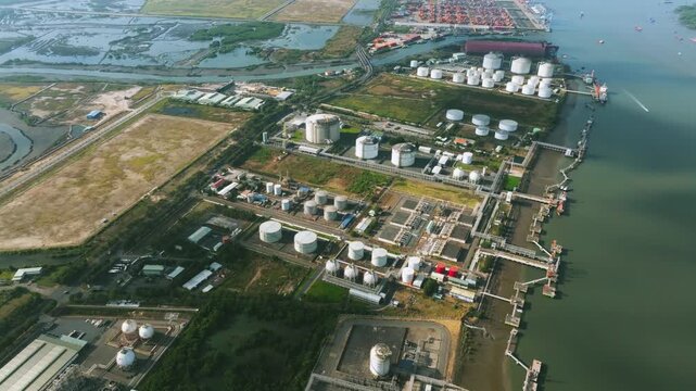 Aerial View of Petrochemical Storage Tank Farm. large industrial facility featuring spherical and cylindrical storage tanks for oil, gas, and chemicals. Located in the Cai Mep industrial zone, Vietnam
