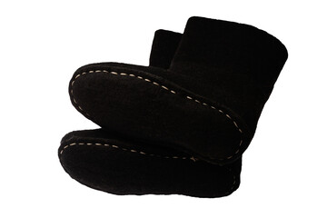 A pair of old hemmed felt boots isolated on a transparent background