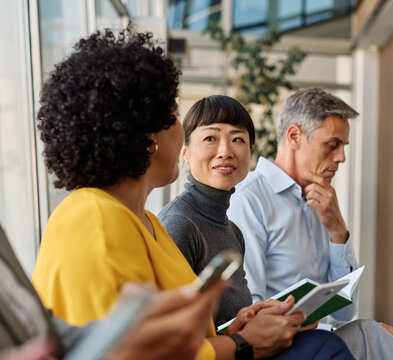 Portrait of a businesspeople sitting in chair and waiting for an interview for job application using a laptop and phone