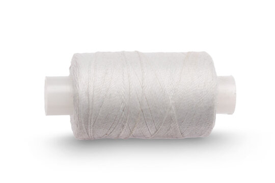 A roll of white thread isolated on a transparent background
