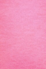 Fototapeta premium Vertical pink paper surface texture