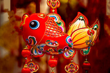 H&agrave;ng M&atilde; Street, Hanoi comes alive with Lunar New Year decorations for the Year of the Horse, featuring traditional red and gold ornaments symbolizing luck, prosperity, and celebration.	