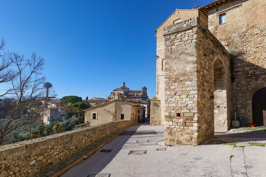 A street among the old stone houses of Montefalco, a medieval village in the Umbria region, Italy.
