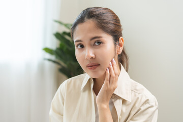 Jaw pain, health care concept. Teeth pain and dentistry asian young woman, girl suffering touching her cheek. Female feeling painful toothache. Unhappy feel bad, diseases in oral, ache nerve and molar