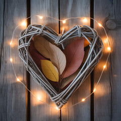 "Rustic Wicker Heart with Dried Leaves and Fairy Lights &mdash; Romantic Wall Decoration on Weathered Wooden Planks, Cozy Cottage Home D&eacute;cor"