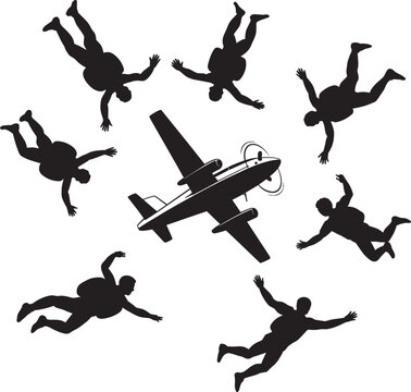 Silhouette of skydivers jumping from an airplane in freefall